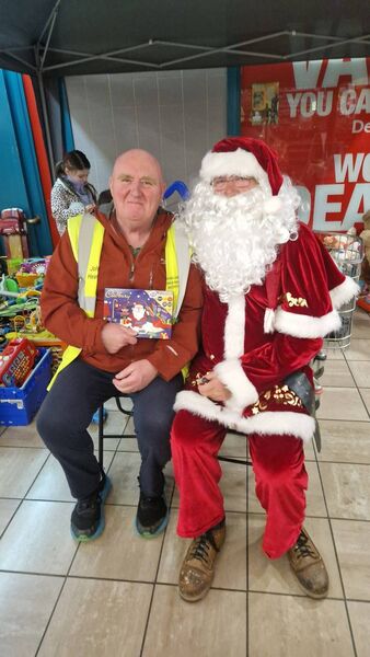 Cllr John Hearne and Santa at Lisduggan Shopping Centre. Cllr John Hearne and Santa at Lisduggan Shopping Centre.