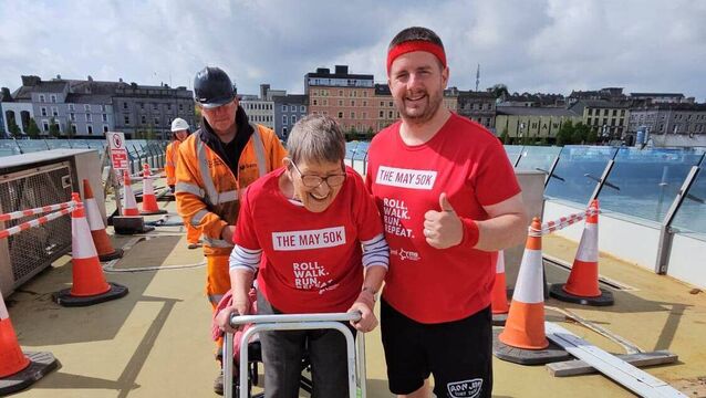 Waterford's Ann Van Hemelendonck and Chris Conroy walk over North Quays bridge for MS funraiser Waterford's Ann Van Hemelendonck and Chris Conroy walk over North Quays bridge for MS funraiser