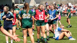 <p>Waterford's Claire Walsh strikes a lone figure amongst the Kerry celebrations.</p> <p>Waterford's Claire Walsh strikes a lone figure amongst the Kerry celebrations.</p>