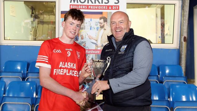 The late Brendan Breen presents the Under 16 Cup to Stradbally's U16 Division 1A trophy to captain Gearóid Power. Photo: Eddie Dee <p>The late Brendan Breen presents the Under 16 Cup to Stradbally's U16 Division 1A trophy to captain Gearóid Power. Photo: Eddie Dee</p>